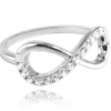 MINET Strieborný prsteň INFINITY s bielymi zirkónmi veľkosť 64